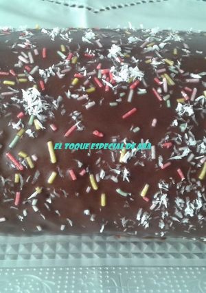 Una foto de Brazo de gitano con nata con cobertura de chocolate