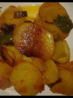 Una foto de Patatas a la panadera en tomatina