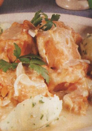 Una foto de Bacalao con vino blanco