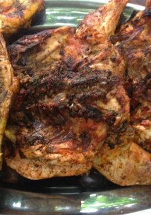Una foto de Pollo canario