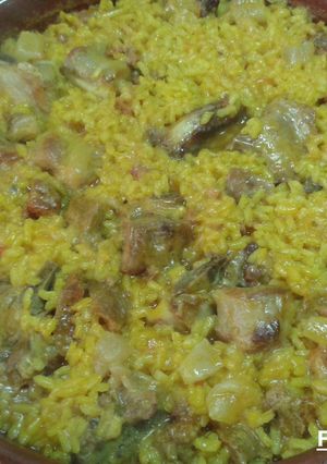 Una foto de Arroz con ibéricos casero