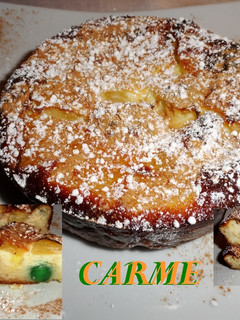 Una foto de Clafoutis de piña y cerezas en almíbar