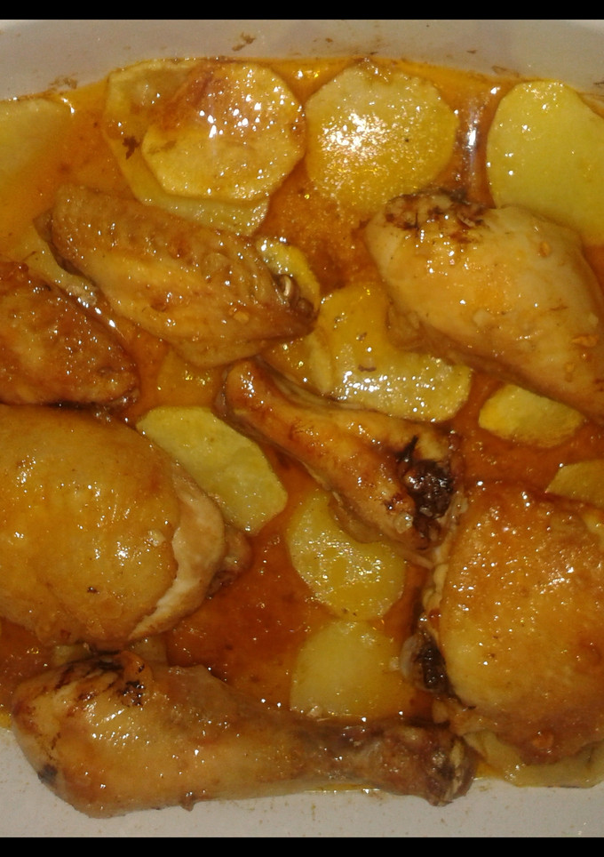 Una foto de Pollo al horno con patatas