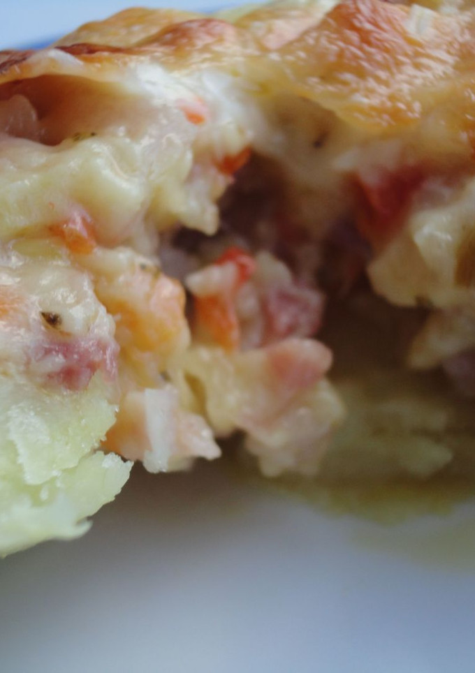Una foto de Patatas rellenas de verdura y bacón
