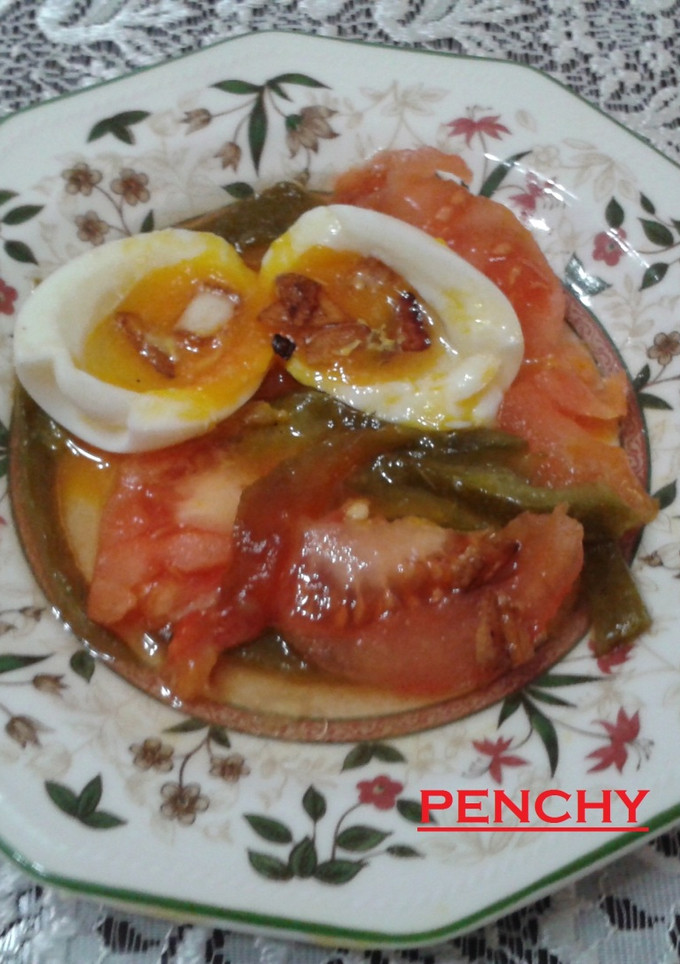 Una foto de Huevos mollet con verduras