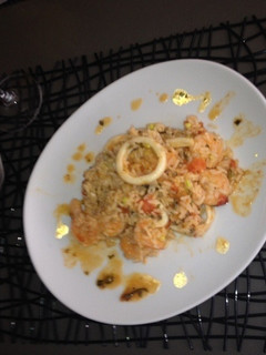 Una foto de Rissotto fruti di mare con tomates cherry