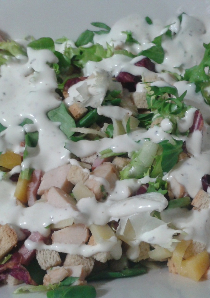Una foto de Ensalada César superior