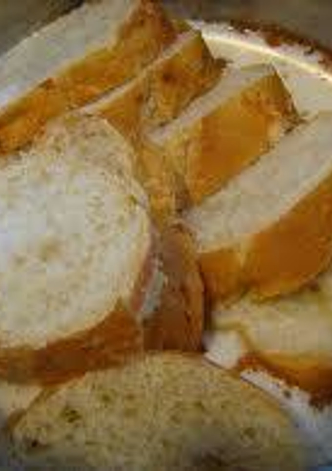Una foto de Pan con mantequilla y azúcar