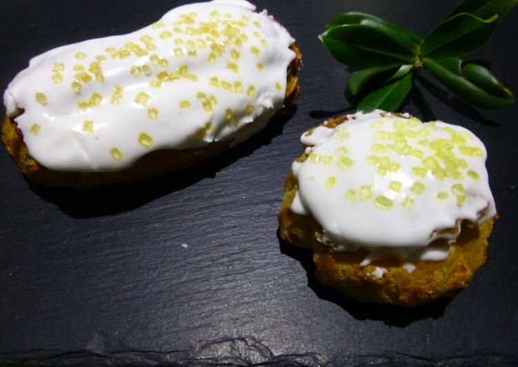 Éclairs y profiteroles rellenos de praliné y cubiertos de glasa