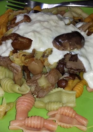 Una foto de Pasta con setas y crema de quesos