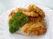 Una foto de corvina frita