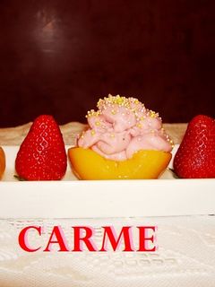 Una foto de Melocotones light con crema de fresas