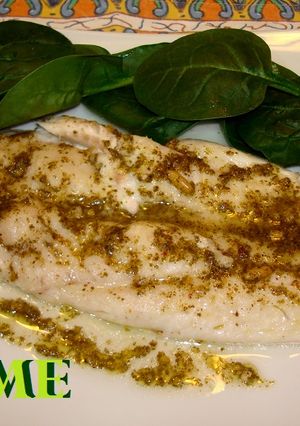 Una foto de Merluza con salsa pesto