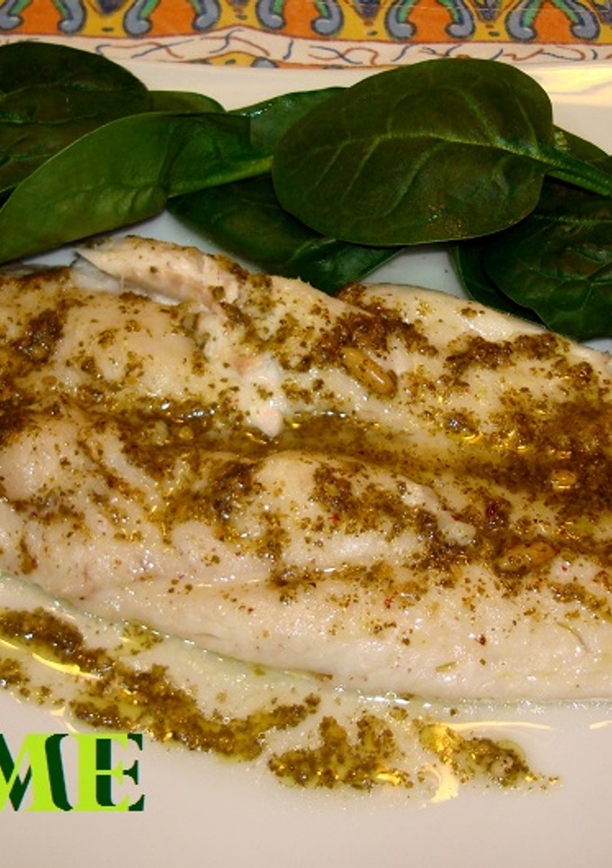 Una foto de Merluza con salsa pesto