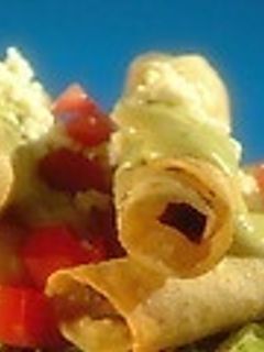 Una foto de Taquitos dorados
