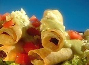 Una foto de Taquitos dorados