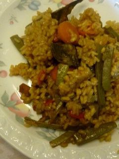 Una foto de Paella de verduras con jamón