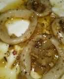 Anillas de calamar encebollado