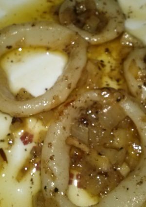 Una foto de Anillas de calamar encebollado
