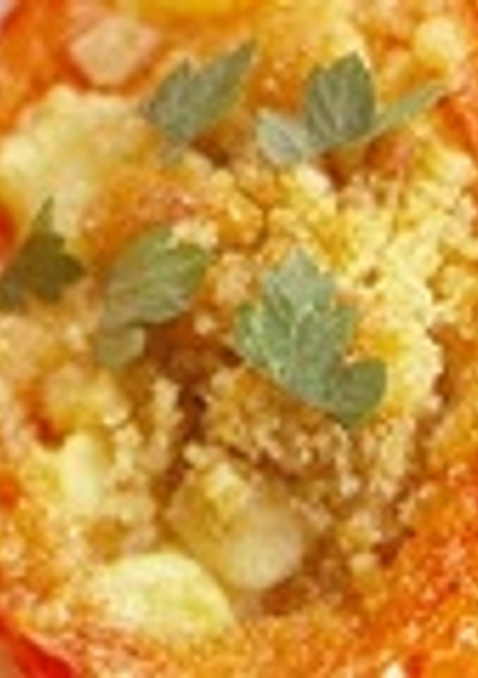 Una foto de Tomates asados con ajo, gorgonzola y hierbas