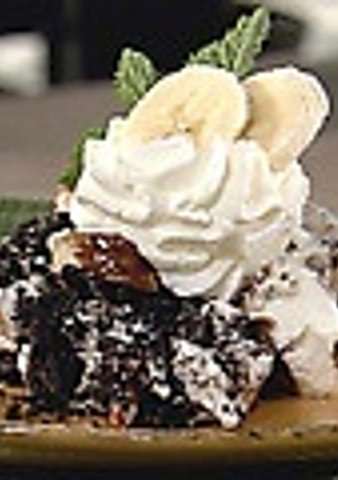 Una foto de Postre de banana con chantilly