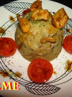 Una foto de Pastel de calabaza, setas y plátano en microondas