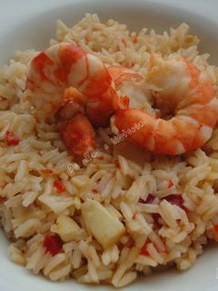 Una foto de Arroz con migas de bacalao y langostinos