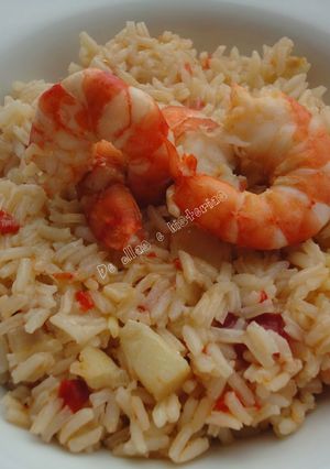Una foto de Arroz con migas de bacalao y langostinos