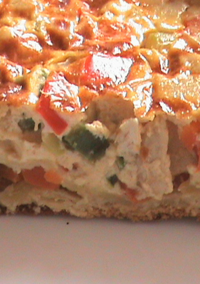 Una foto de Quiche de pollo con verduras