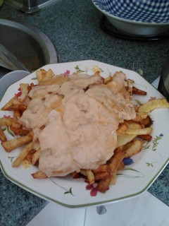 Una foto de Filetes de pollo al queso
