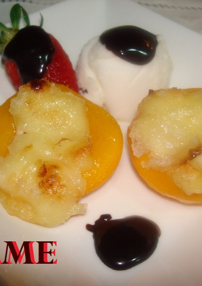 Una foto de Melocotones con queso brie gratinado