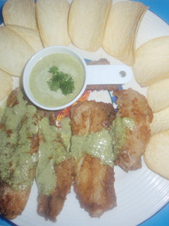 Una foto de Chuletas de pescado con chimichurri