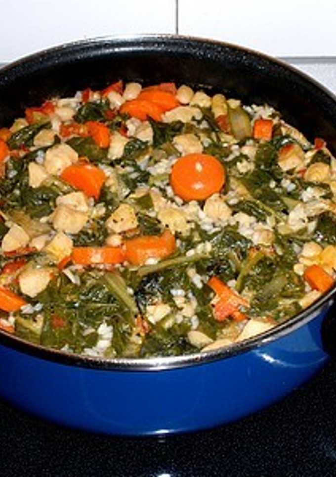 Una foto de Arroz con acelgas y merluza