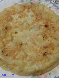 Una foto de Tortilla de patatas con puerros