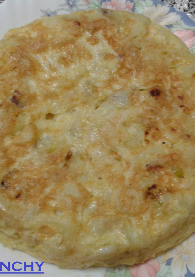 Una foto de Tortilla de patatas con puerros