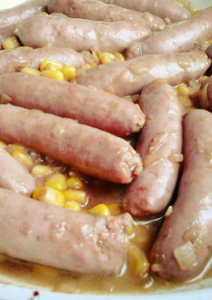 Una foto de Salchichas al vino con maíz