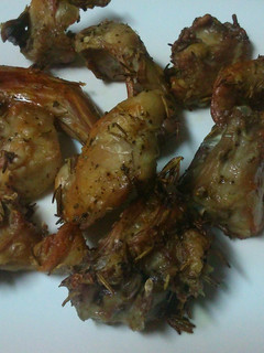 Una foto de Conejo al horno con tomillo y romero