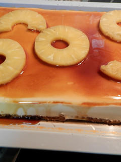 Una foto de Pastel de queso nata y piña