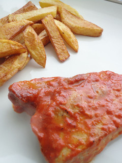 Una foto de Secreto con salsa fina de piquillos