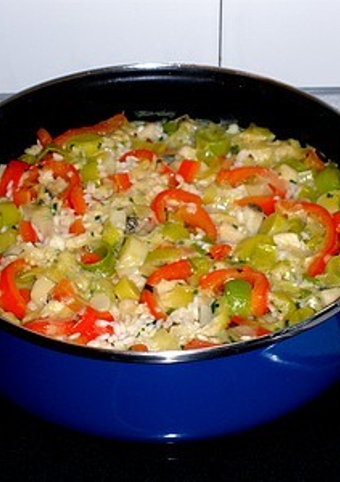 Una foto de Arroz con bacalao, puerros y morrón