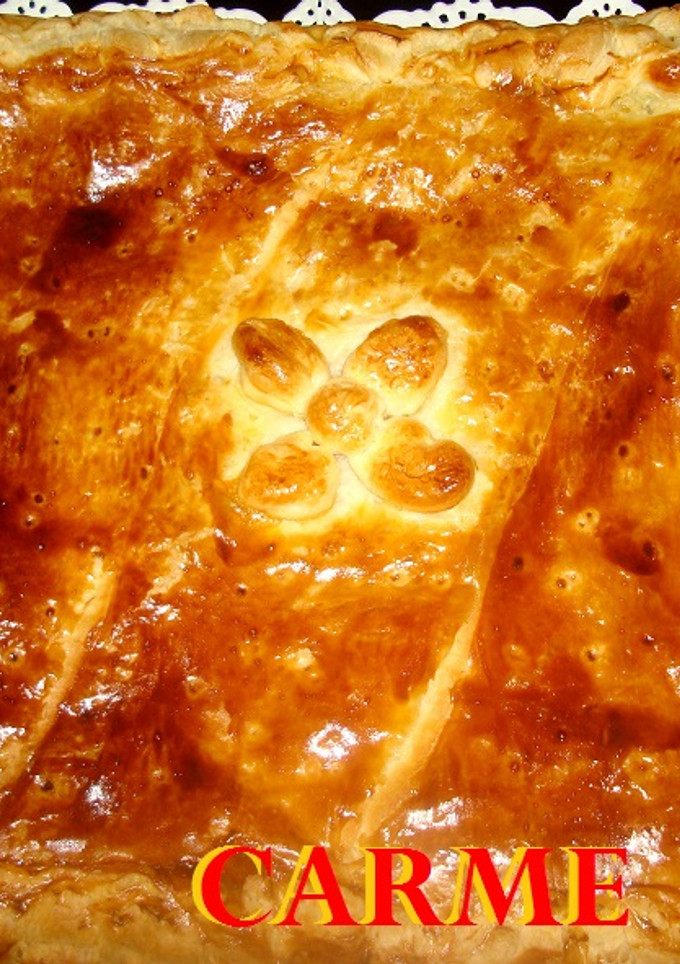 Una foto de Empanada de champiñones y carne de cordero