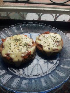 Una foto de Milanesas de zapallito napolitana