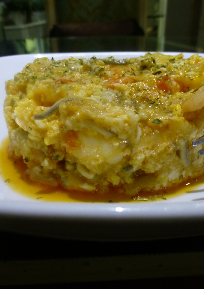 Una foto de Revuelto de patata con gulas