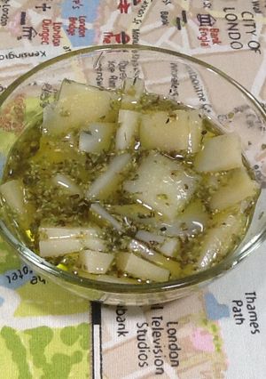 Una foto de Queso manchego macerado con orégano