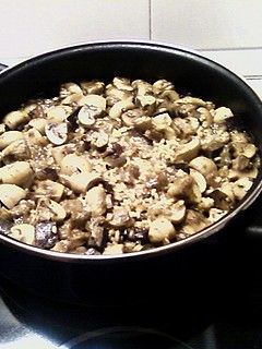 Una foto de Arroz con champiñones y berenjena