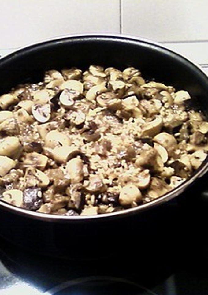 Una foto de Arroz con champiñones y berenjena