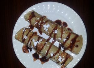 Una foto de Crepas de granola y chocolate