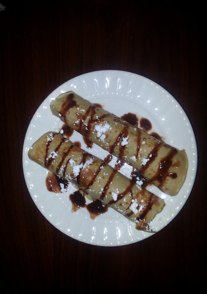 Una foto de Crepas de granola y chocolate