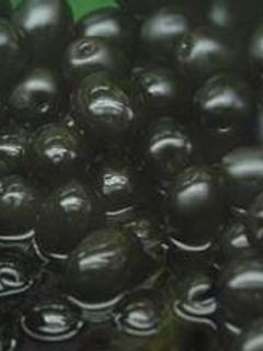 Una foto de Olivas negras