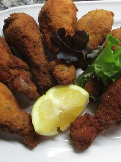Una foto de Muslitos de pollo rebozados con pan rallado y especias